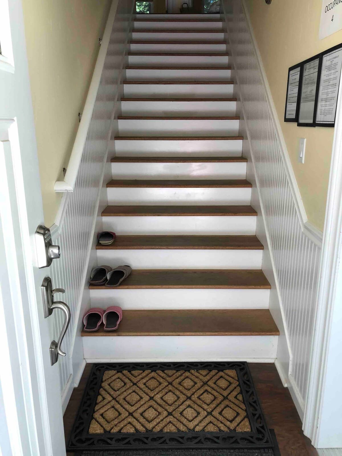 Front entry staircase leading up into the home